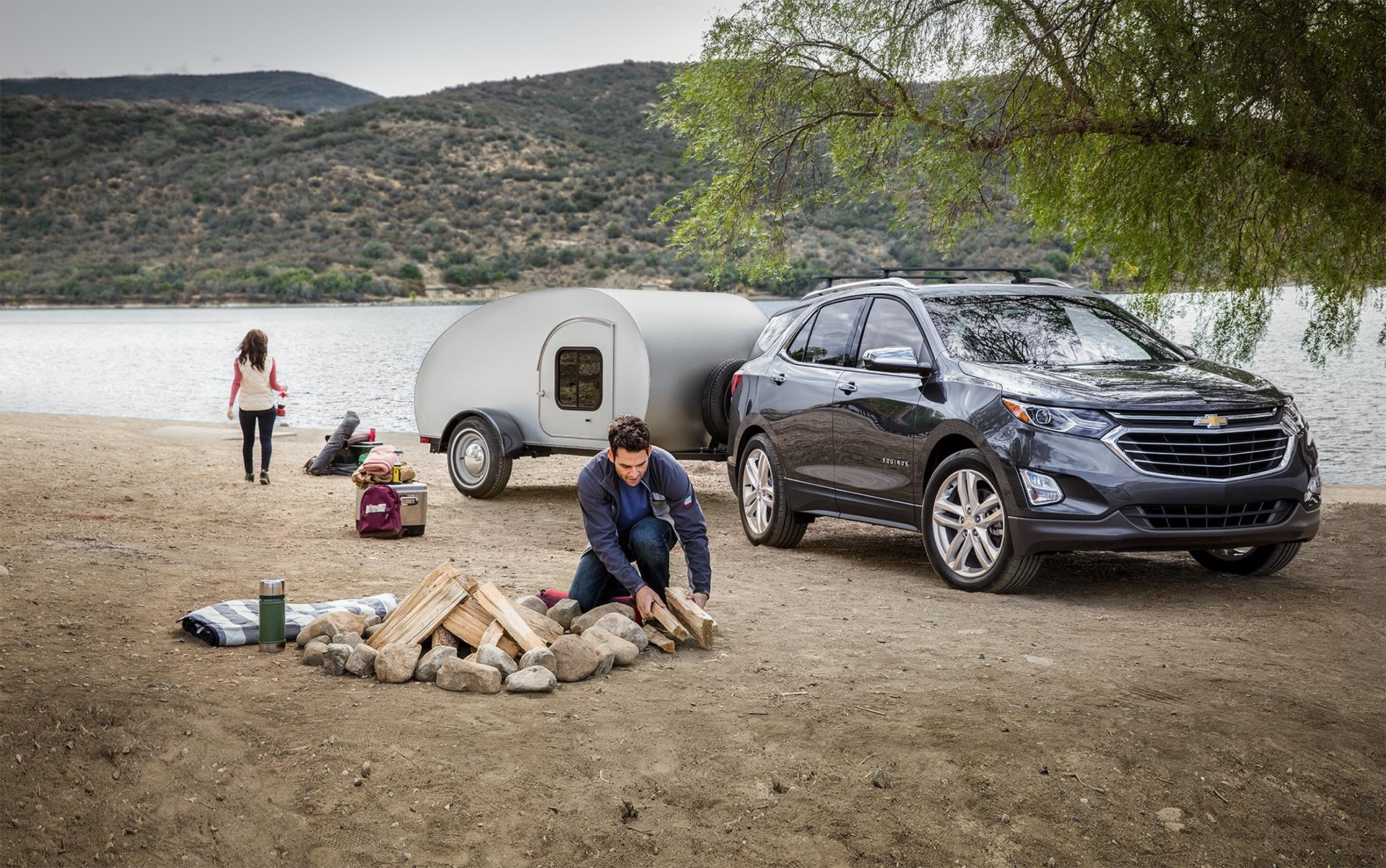 family enjoying near lake