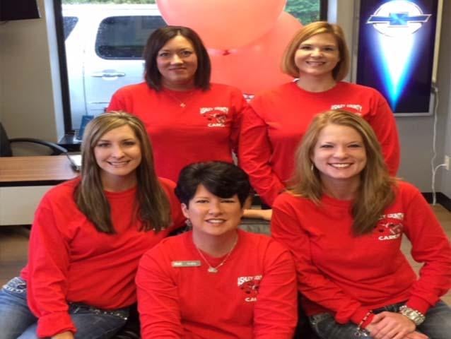 five team members group photo