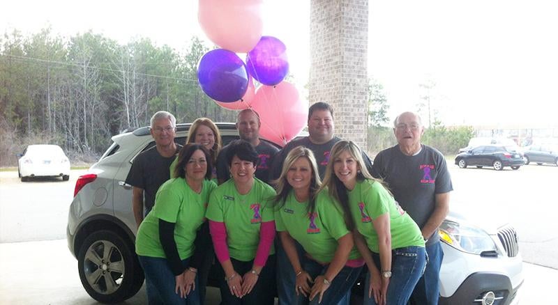 team group photo in black and green