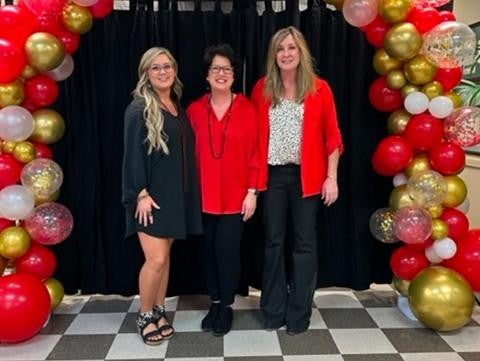 three members group photo